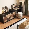 Black Dresser With Leaf Patterned Drawers White Round Stool Table Lamp And Mirror