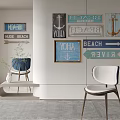 Modern Interior Accent Chair With Beach Themed Wall Decor Signs And Natural Light