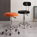 Orange and Black Adjustable Rolling Stools with Chrome Bases in Modern Interior 3d model