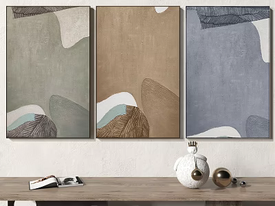 Three Abstract Paintings On Wall With Wooden Table And Decor Items 3d model