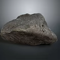 Natural Gray Rock With Rough Surface And Textured Appearance On Dark Background