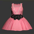 Elegant Pink Dress With Black Floral Decoration And Pearl Necklace