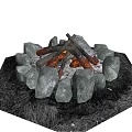 Bonfire Surrounded By Stone Circle With Burning Logs And Flames In Grass