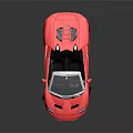 Red Convertible Sports Car With Sleek Exterior And Black Alloy Wheels