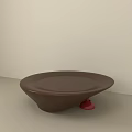 Modern Brown Coffee Table With Curved Design And Red Base Support 3d model