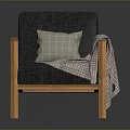 Gray Fabric Upholstered Chair With Wooden Frame Plaid Pillow And Blanket