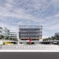 Modern School Building With Theatre Glass Facade Yellow Accents And Landscaped Trees