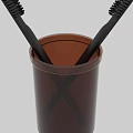 Brown Glass Cup With Black Toothbrushes And Orange Rim For Bathroom Use