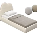 Beige Kids Bed With Curved Upholstered Headboard White Pillow Light Brown Blanket And Decorative Balls