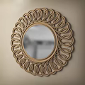 Decorative Round Mirror With Intricate Woven Wooden Frame On Beige Wall