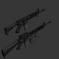 Two Modern Tactical Rifles With Detachable Magazines And Black Finish