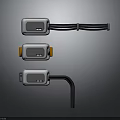 Three Contemporary Electrical Control Devices With Gray Bodies Orange Accents And Connection Cables