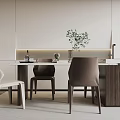 Modern Dining Table Set With Mixed Color Chairs And Green Plant In Minimalist Kitchen
