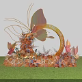 Interactive Area With Yellow Arch LOVE Lettering Butterfly Decorations And Flower Arrangement On Green Grass