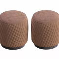 Two Brown Round Sofa Stools With Vertical Striped Velvet Upholstery And Black Base