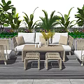 Outdoor Sofa Seating Area With Wooden Furniture And Lush Greenery On Terrace