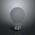 White Light Bulb With Smooth Exterior And Shiny Metal Base On Dark Gray Background