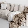 Cozy Beige Fabric Multi Seat Sofa With Plush Pillows And Knitted Blanket