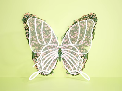 Butterfly Shaped Floral Art Installation With White Frame And Pink Flowers On Green Background 3d model