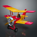 Colorful Red And Yellow Toy Biplane With Metal Propeller And Black Wheels On Dark Background