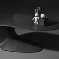 Modern Black Side Table with Curved Smooth Surface and Decorative Rabbit Figurine Gold Sphere Black Cube