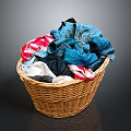 Wicker Storage Basket Filled With Colorful Clothes For Home Laundry Use