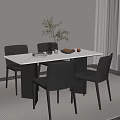 Modern Dining Table Set With White Tabletop Grey Chairs Green Plant In Vase And Fruits