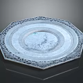 Intricate Octagonal Metal Sculpture With Carved Patterns And Star Shaped Center