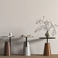 Stylish Side Tables with Conical Bases Black Round Tops Coffee Cup Open Book Twig Vase