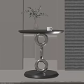 Modern Side Table With Black Tabletop Silver Ring Base Green Plant And White Cup 3d model