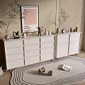 White Entryway Cabinet And Sideboard With Decorative Items Plants Poster And Rug
