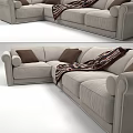 Brown Sectional Sofa Featuring White Cushions And Striped Blanket Details 3d model