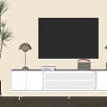 Modern White TV Stand With Flat Screen TV Table Lamp And Decorative Plants