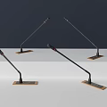 Four Professional Microphones With Black Poles And Square Brown Bases On Grey White Gradient Background