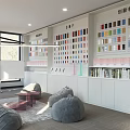 Contemporary Public Office Space With Bean Bags Whiteboards Color Charts And Natural Light