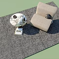 Light Beige Single Sofa With Spherical Ornament And Small Square Item On Gray Textured Rug