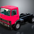 Red Chassis Truck With Cab And Large Wheels For Heavy Duty Transport