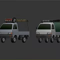 Two Small White Trucks Featuring Yellow Roof Rack Red Equipment And Green Staff Label