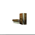 Brown Cover Books With Intricate Gold Decorative Patterns Stacked Together