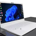 Three Modern Black And White Laptops With Blue Abstract Screens On Table