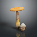 Mushroom With Orange Yellow Cap And Small White Mushroom On Gray Background With Reflection
