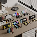 Entertainment Electronics With Various Colored Game Consoles Controllers And Charging Docks 3d model