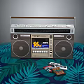 Vintage Boombox With Cassette Tapes On Green Leaf Patterned Cloth Displaying KOL