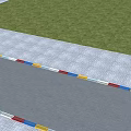 Road Infrastructure With Colorful Stripes Paved Along Roadside Near Green Grass