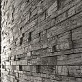 Building Exterior Wall With Natural Stone Texture And Stacked Brick Design