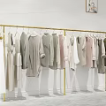 Golden Clothes Rack Displaying Various Colored Clothes On Minimalist White Wall Background 3d model