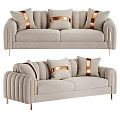 Elegant Beige Two Seater Sofa With Golden Trim And Decorative Pillows Design