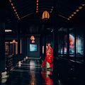 Traditional Ancient Chinese Architecture Corridor With Hanging Lanterns And Red Costume Figure