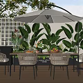 Stylish Outdoor Table With White Umbrella Wicker Chairs And Green Plants On Patio