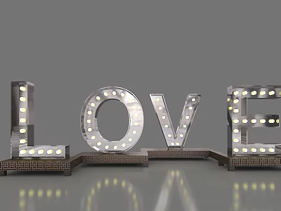 3D LOVE Letters With Light Bulbs And Metallic Finish On Reflective Base 3d model
